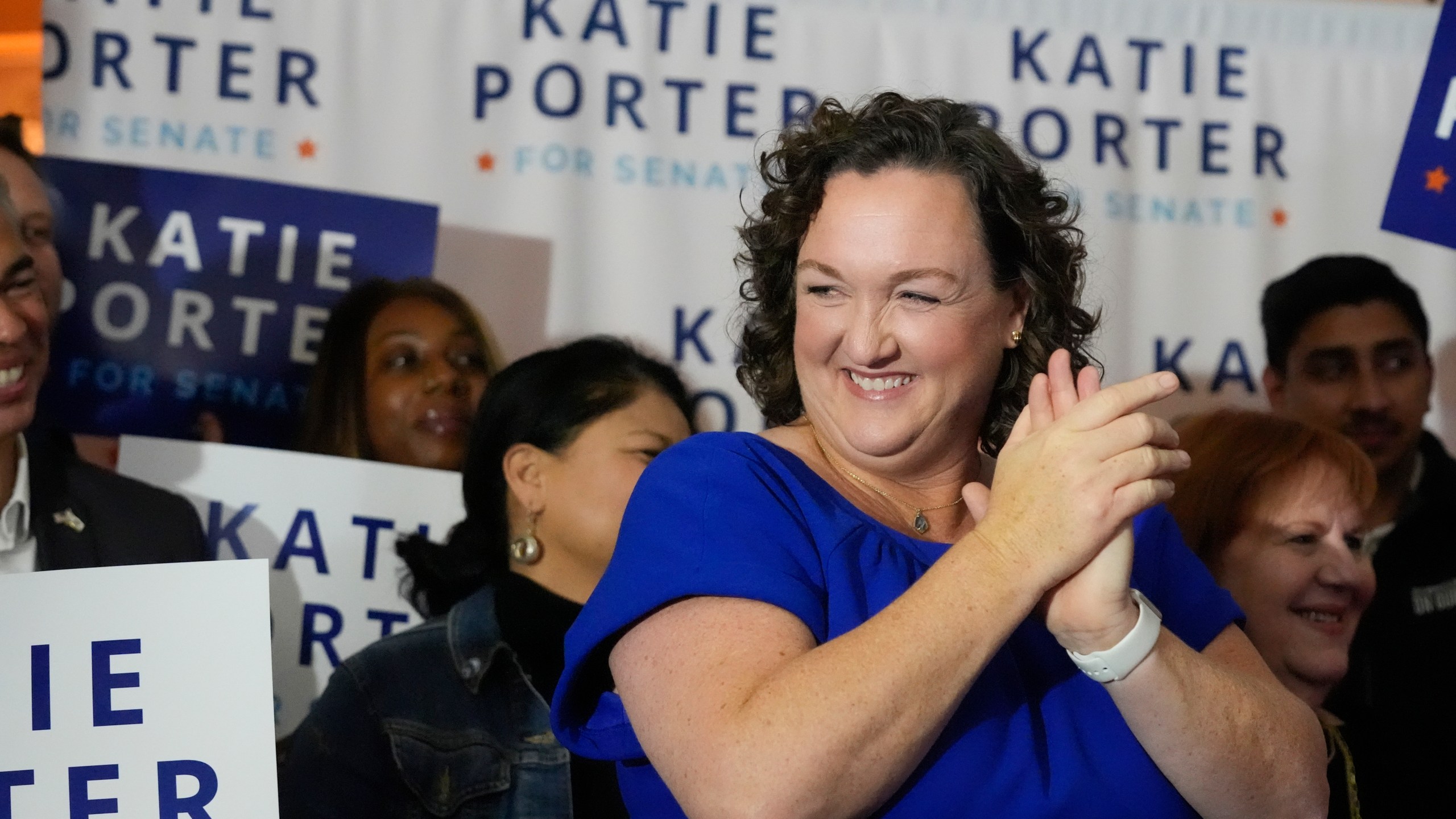 FILE - U.S. Rep. Katie Porter, D-Calif., smiles as she prepares to address supporters at an election night party, Tuesday, March 5, 2024, in Long Beach, Calif. (AP Photo/Damian Dovarganes, File)