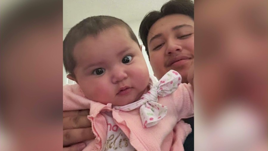 Joseph Perez, 21, and  his baby daughter, Nicole, are seen in a family photo. 